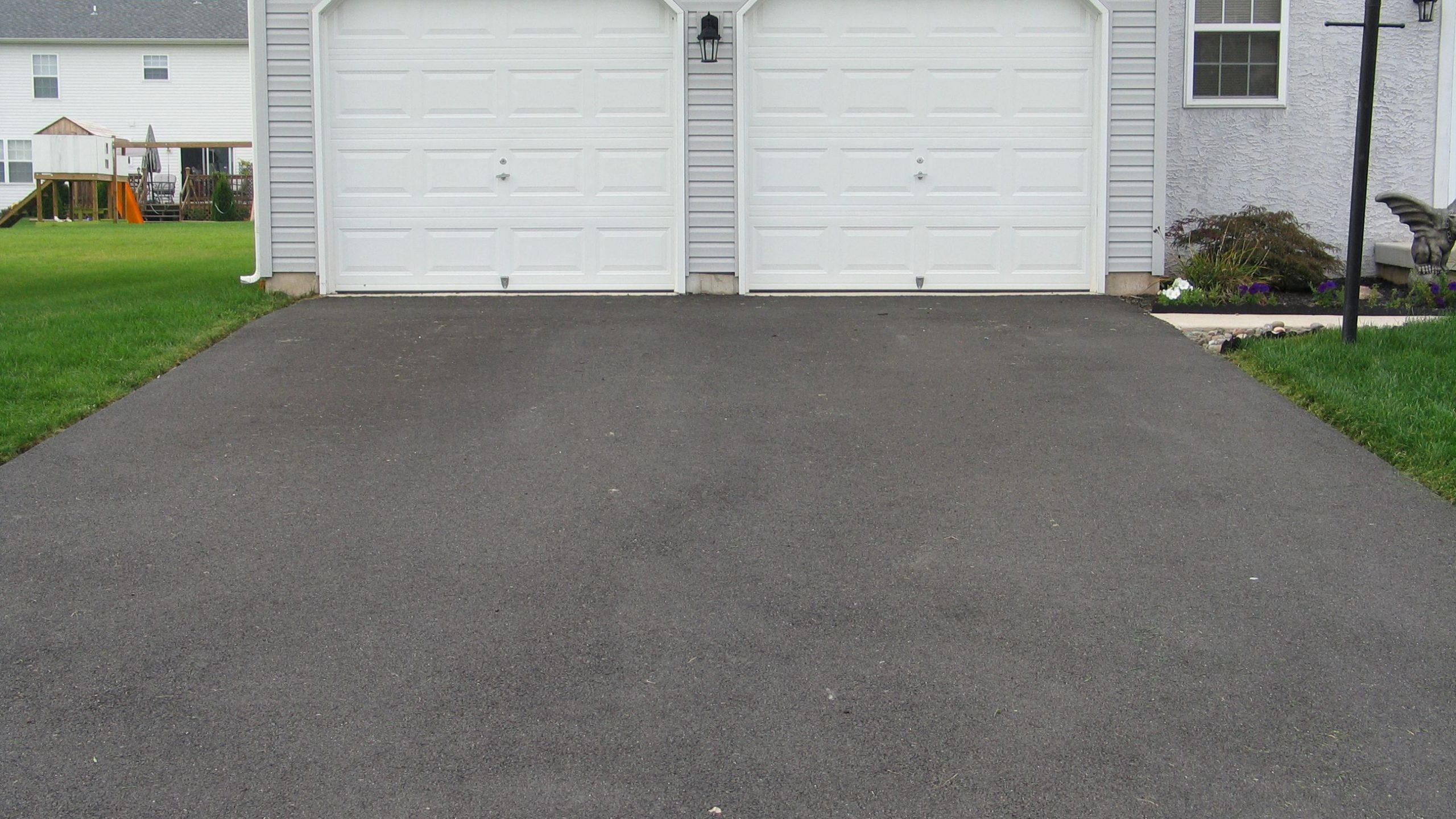 Professional parking lot seal coating service in Escondido WA by FRS Remodeling